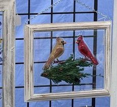 Handmade dimensional frame with a pair of cardinals